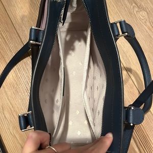 Used a few. Just don’t use. Kate spade medium purse. No stains. Needs cleaning
